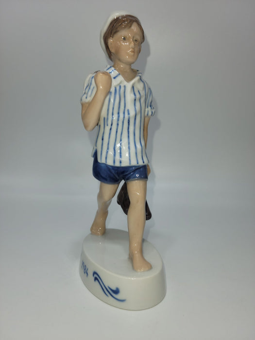 Bing And Grondahl Figurine Of The Year 1984 Peter with Barefeet and Fish by Soren Brunoem