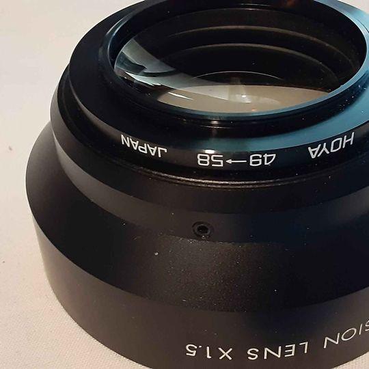 Camera -  Black TV camera Tele Conversion lens 1.5