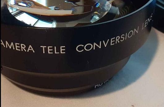 Camera -  Black TV camera Tele Conversion lens 1.5