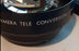 Camera -  Black TV camera Tele Conversion lens 1.5